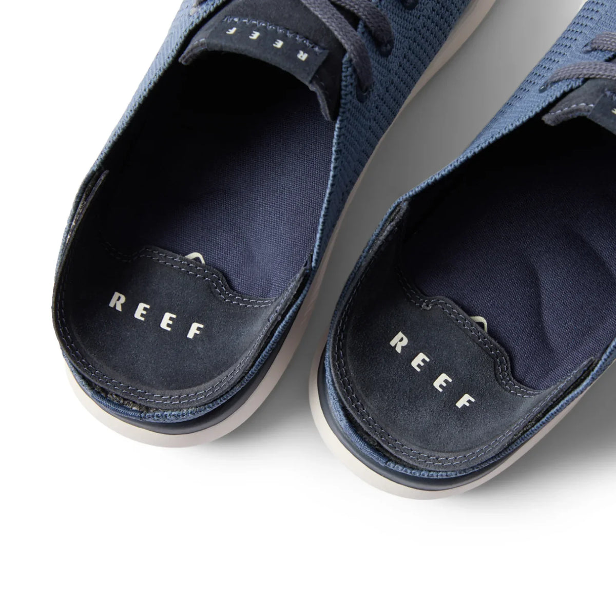 Top view close-up of the heel of navy Neptune HT men's sneakers with water-friendly, cushioned REEF support.