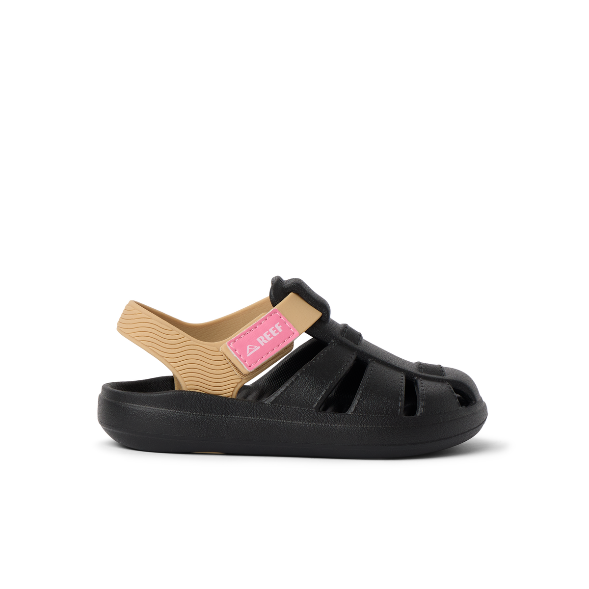 Little Totally Beachin black and tan girls’ sandal facing right, featuring soft cushioning and anatomical arch support.