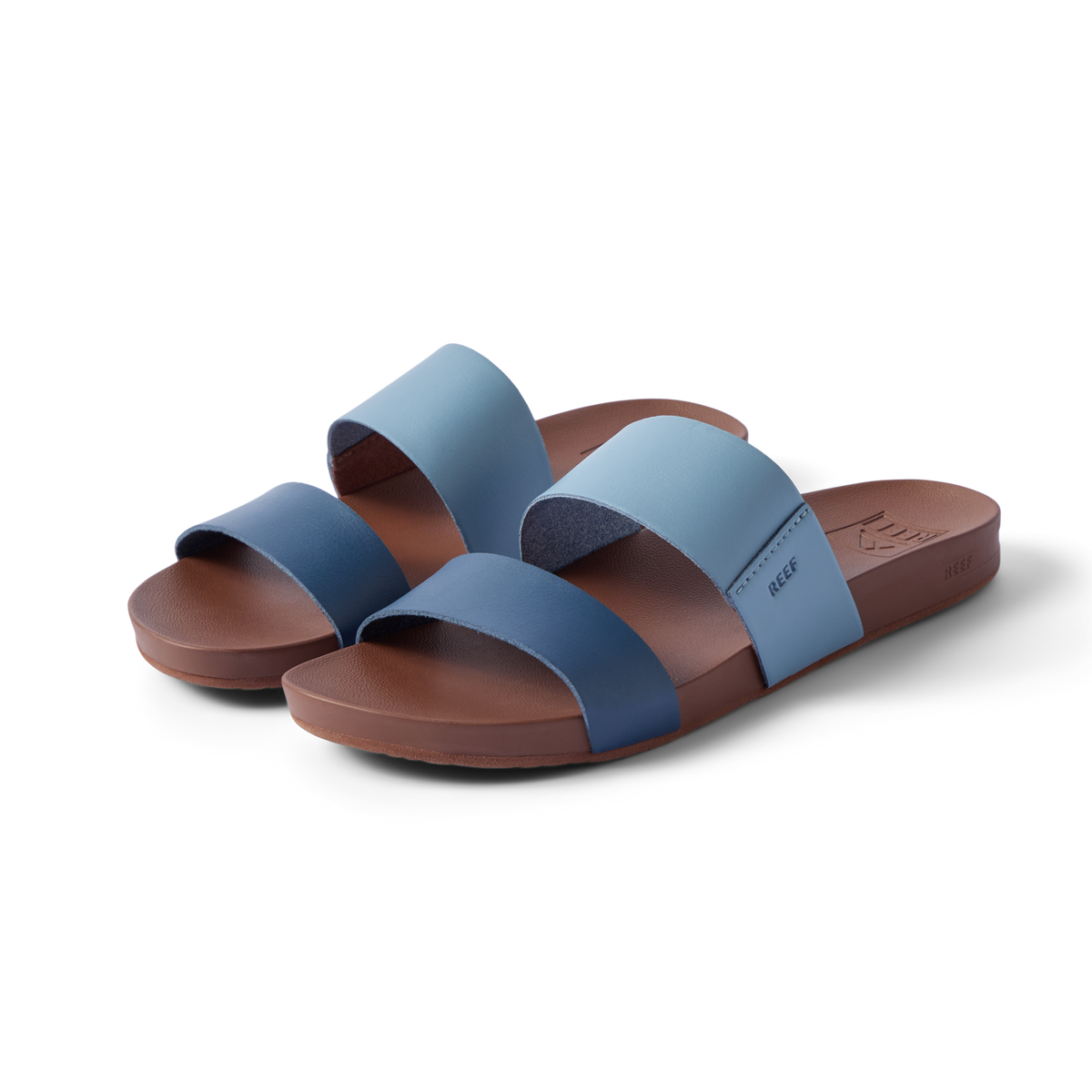 Pair of Cushion Vista sandals facing right, showing front and side straps in navy and light blue, lightweight and cushioned.