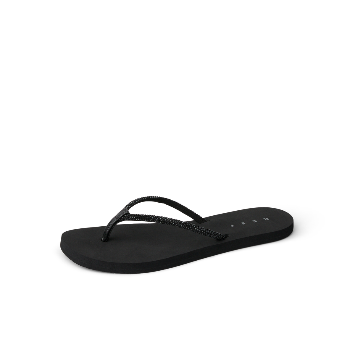 Bliss Bling Fling black flip flop facing right, close-up of front straps, beach-inspired comfort with arch support.