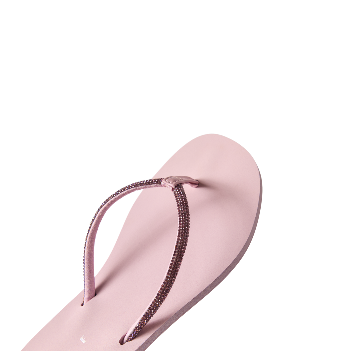 Bliss Bling Fling women's sandal facing left, close-up of toe area with pink, sparkly straps, beach-inspired comfort design.