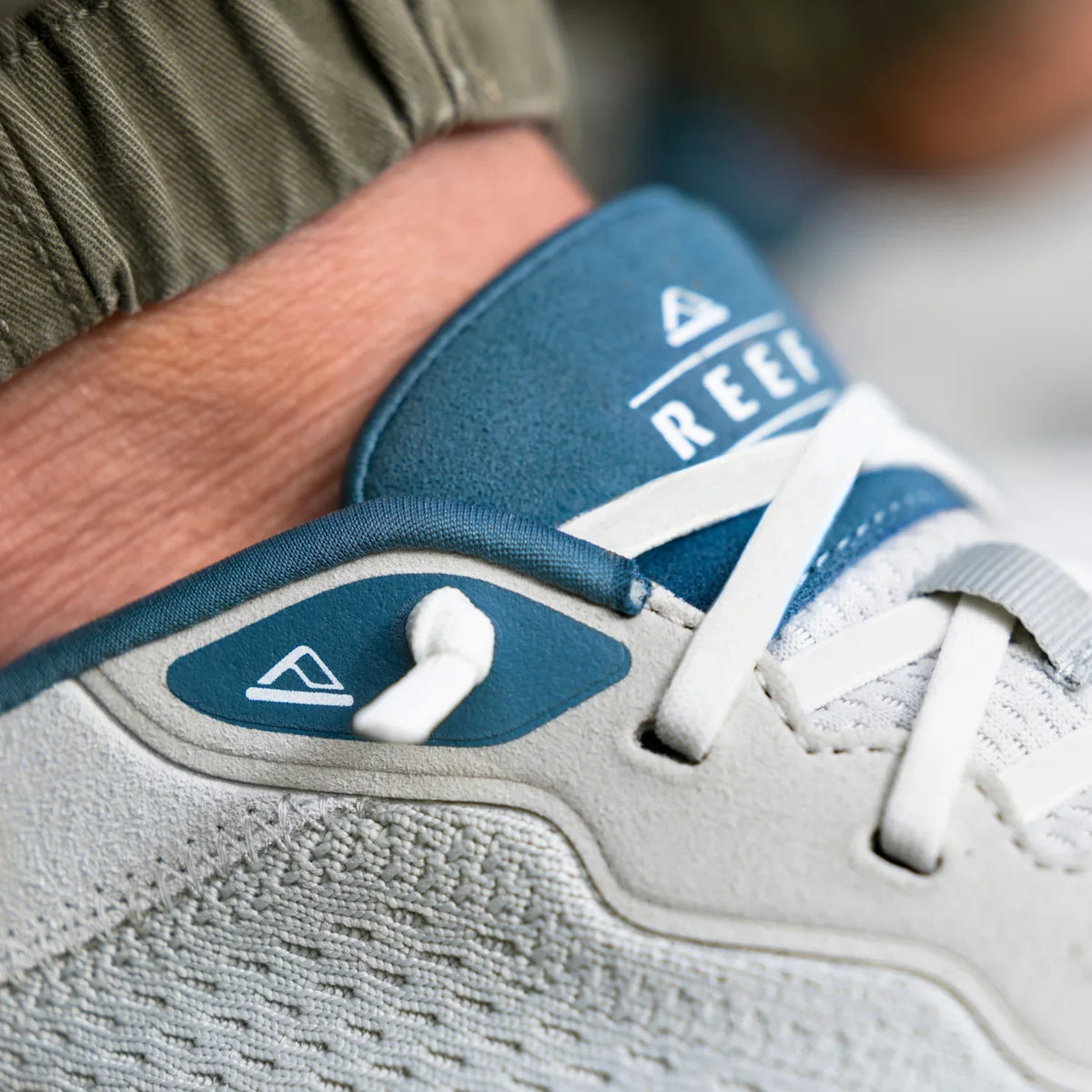 Close-up of the Shoreline Del Mar left sneaker facing right, showing the tongue and laces with surf-inspired comfort design.