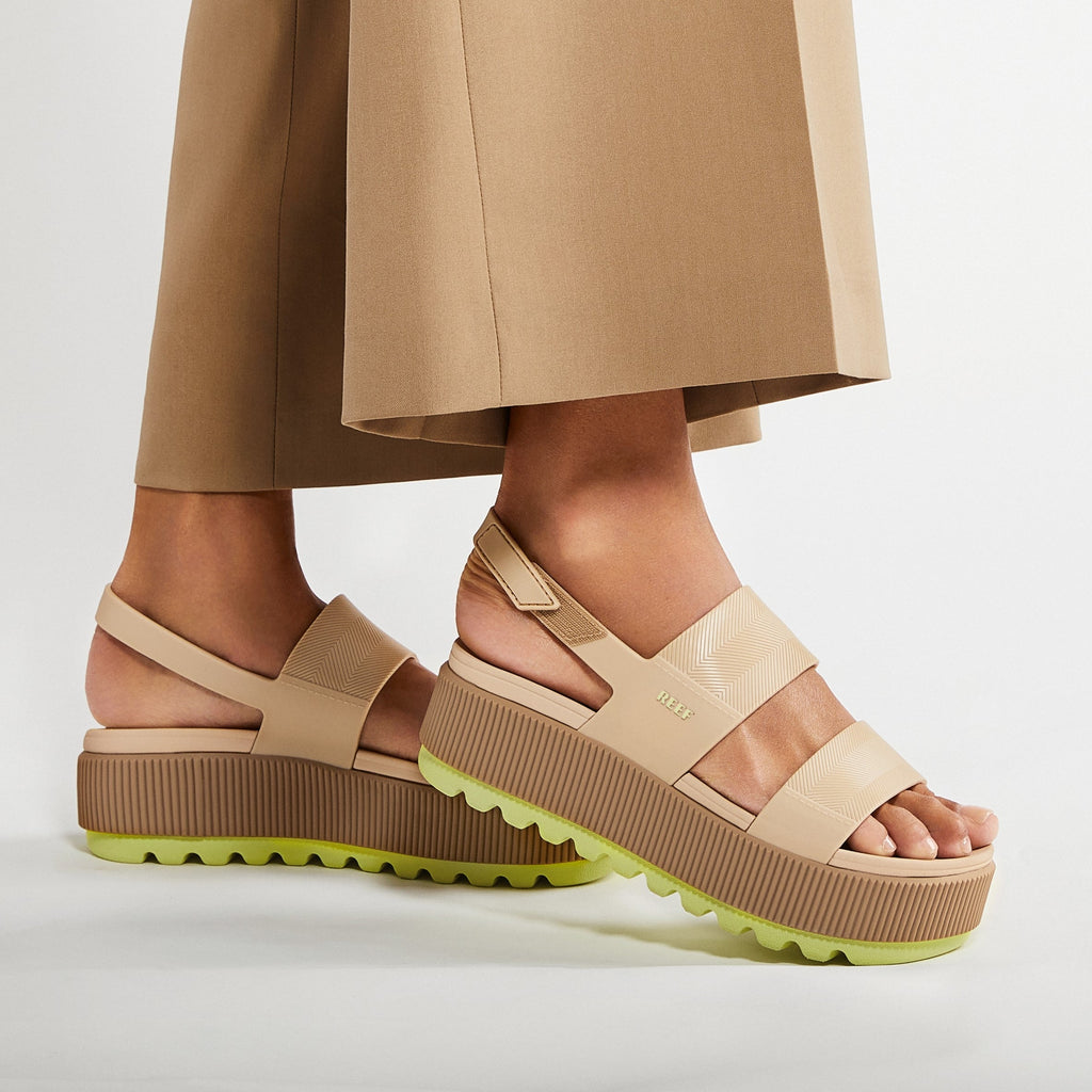 Water Vista Higher women's beige platform sandals facing right, showing side and sole, with cushioned arch support.