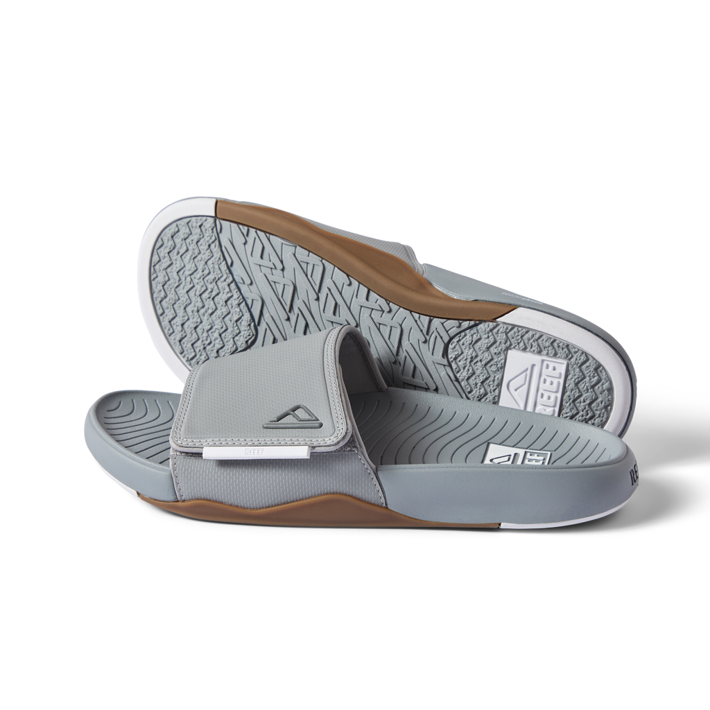 Phantom Slab men's slide sandals in grey and white, right-facing, showing top strap and sole with arch support design.