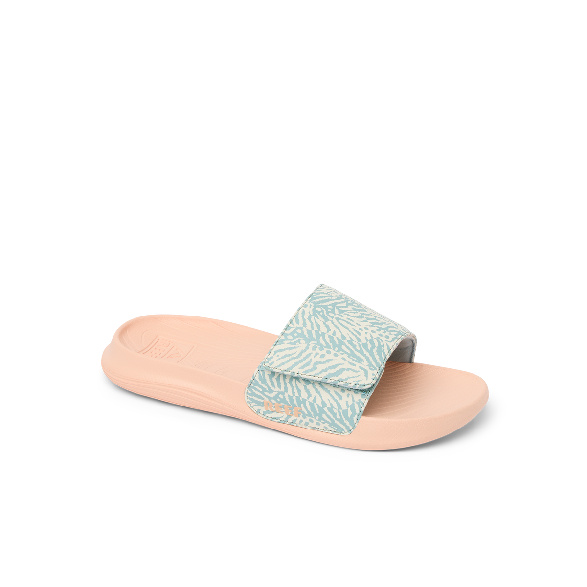 Kids Salty Slide for girls facing left, close-up of the top and sole with cushioned footbed and patterned strap.