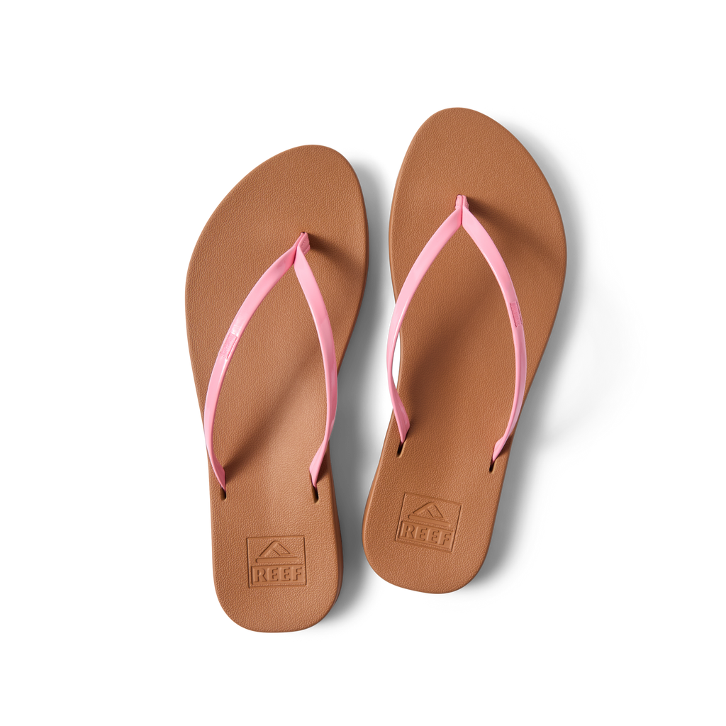 Top view of Cushion Slim women's flip flops with pink straps and brown cushioned footbeds, designed for beach comfort and support.