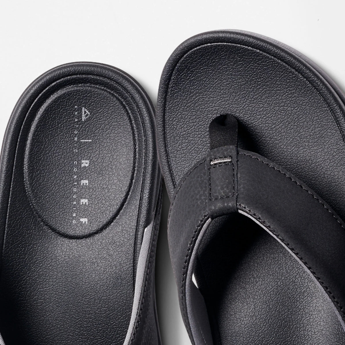 Close-up of the top view of the black Phantom Bonzer men's sandal facing upward with comfort cushioning and arch support.