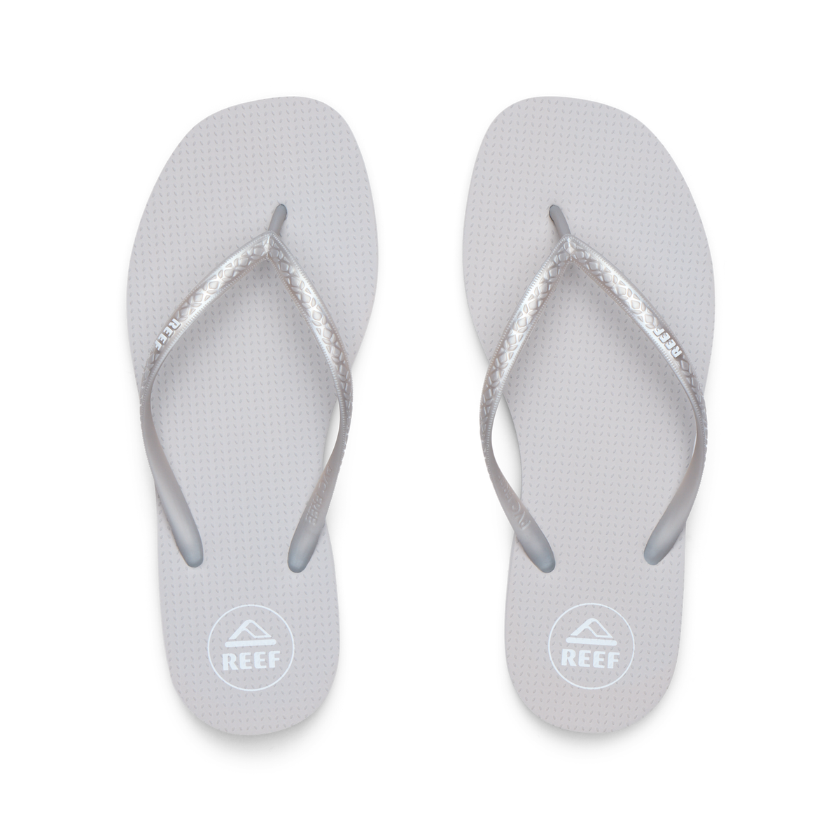 Seaside Square Toe women's flip flops facing up, silver metallic straps, beach-inspired comfort with arch support.