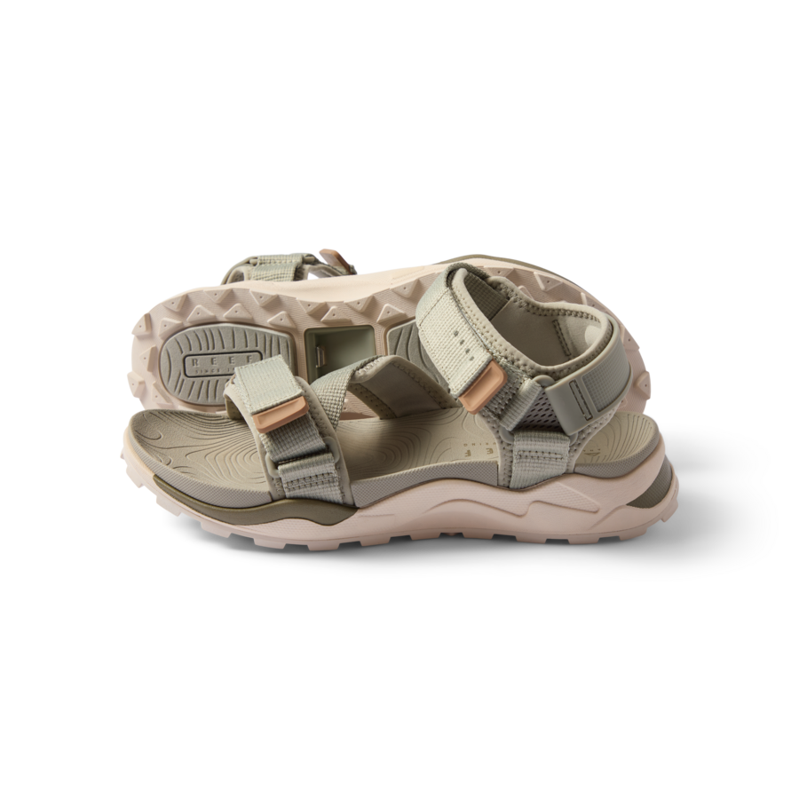 Cross-Shore men's sandal facing right, close-up of adjustable straps, cushioning, and textured outsole for beach comfort.