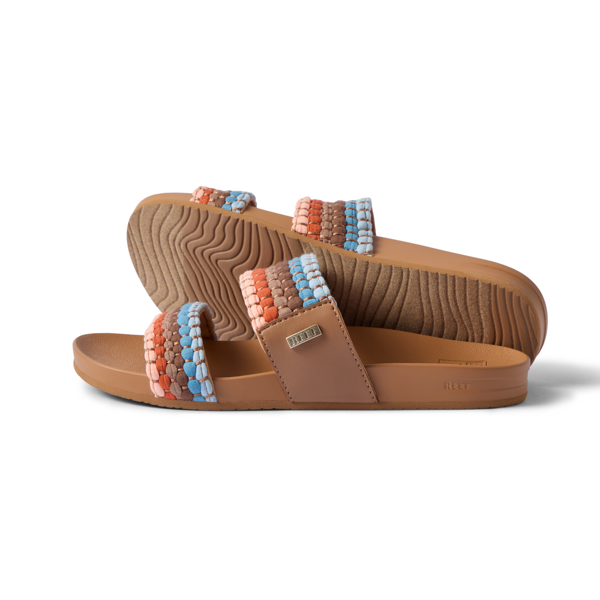 Pair of Cushion Vista sandals facing right showing woven straps and contoured footbed with arch support, beach-inspired comfort.