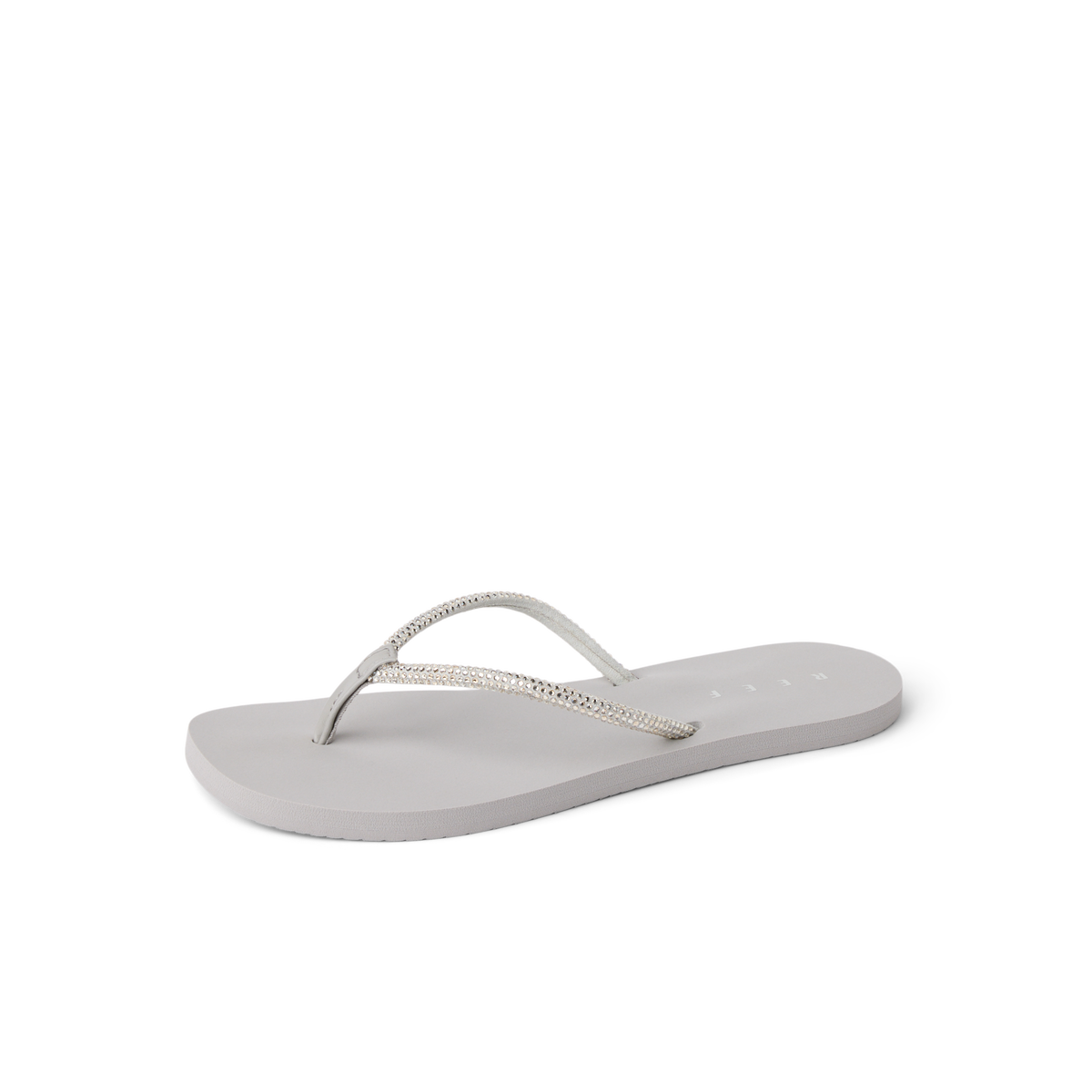 Bliss Bling Fling silver women’s flip flop facing left, soft-rebound cushioning with anatomical arch support for beach comfort