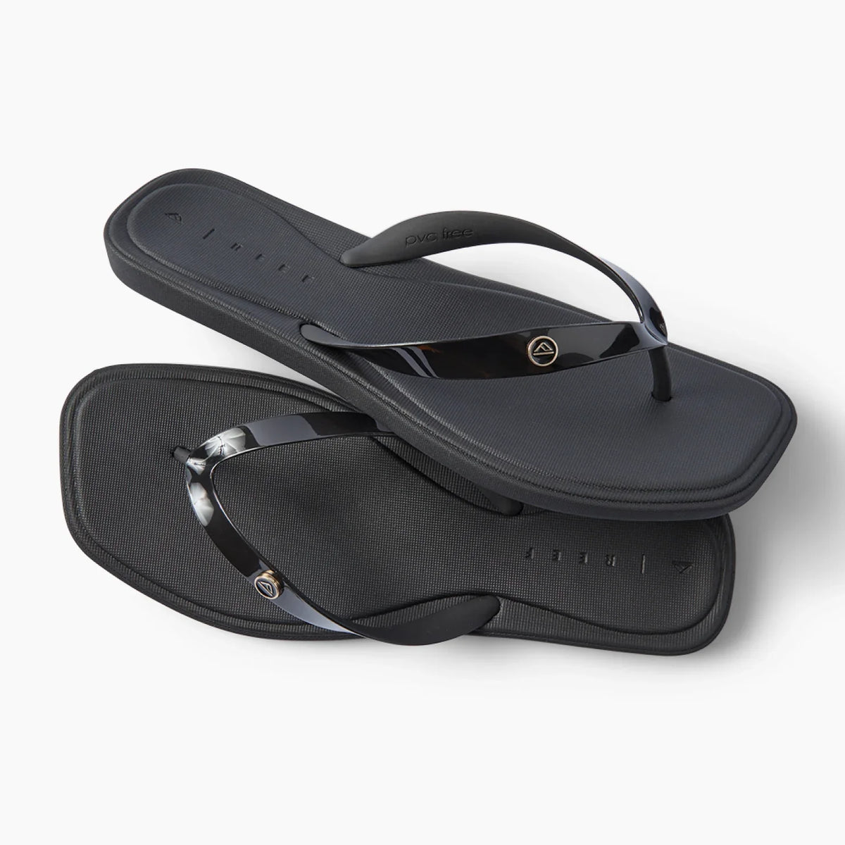 Solaye black water friendly flip flops facing right with sleek jelly straps and cushioned footbeds