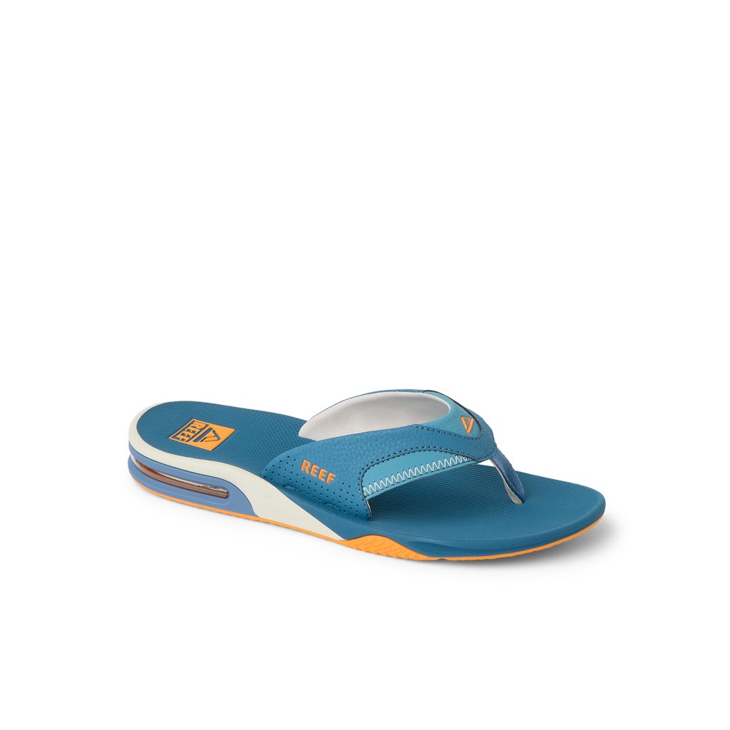 Fanning men's blue and marigold flip flop facing right, featuring anatomical arch support and soft cushioning for comfort.