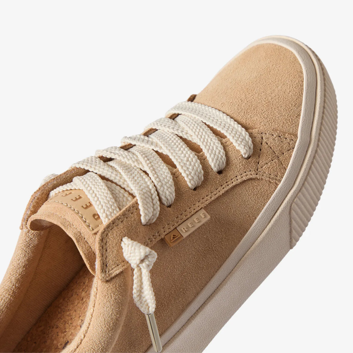Close-up of the top and front of the Lay Day Dawn tan suede shoe facing right, designed for comfort and beach lifestyle.