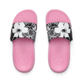 Kids Salty Slide top view facing up, pink footbed with black and white floral strap, water-friendly slides for girls aged 5-10.