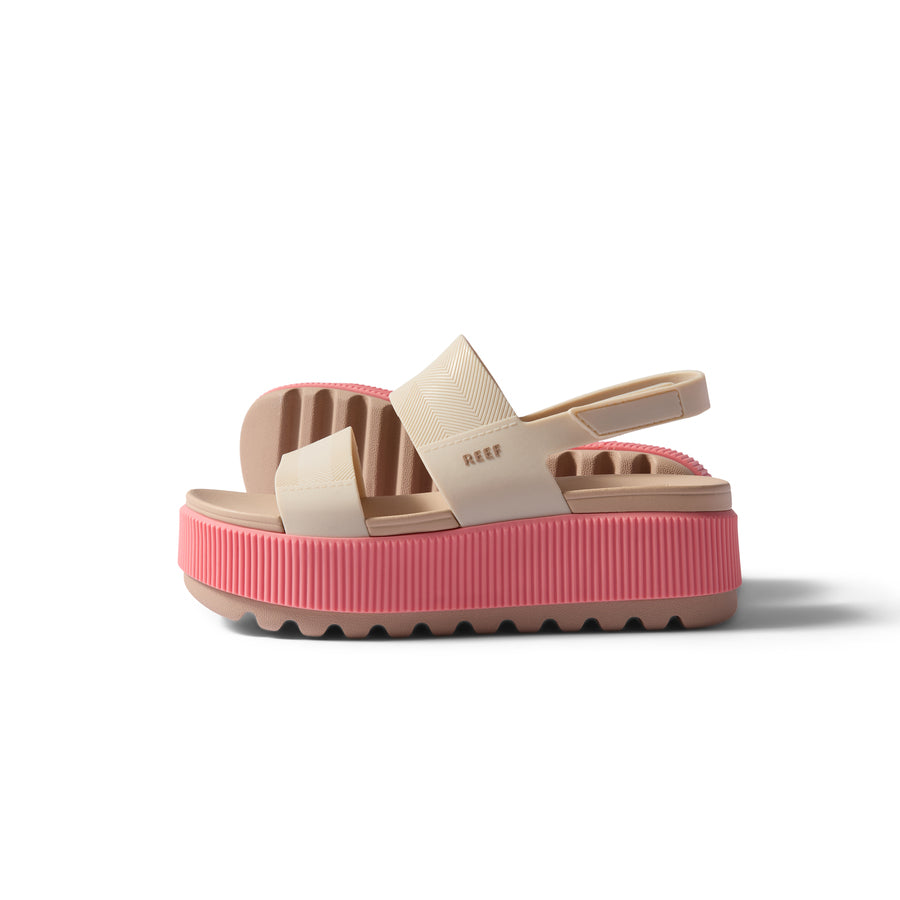 Water Vista Higher sandal facing left, soft pink tan platform with REEF branding, beach-inspired comfort design.
