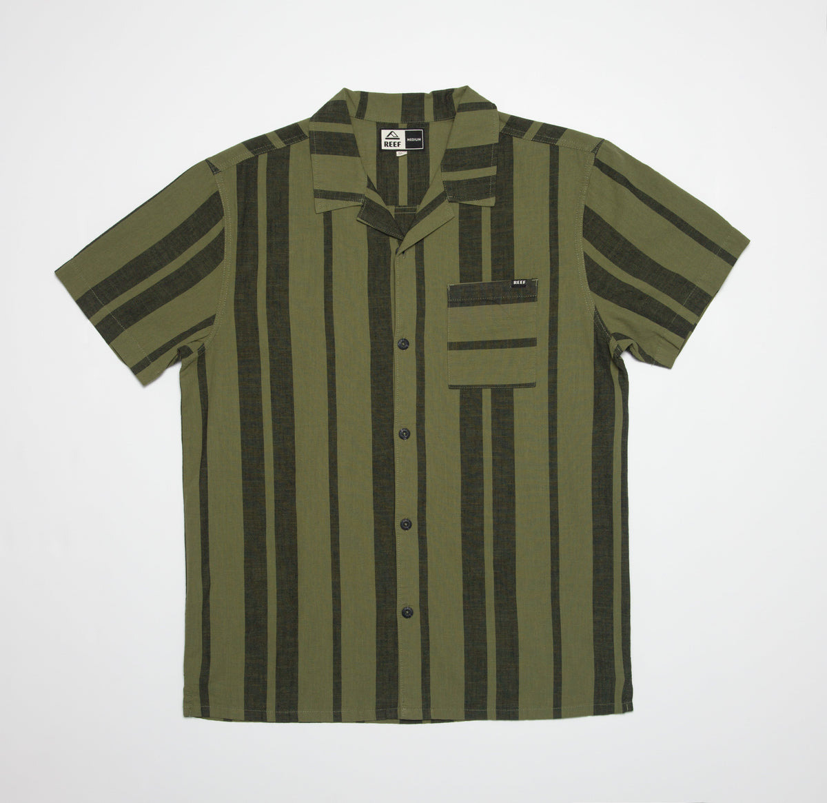 Flat lay of olive and dark green striped Angelo Short Sleeve Camp Shirt with front pocket and button closure designed for beach lifestyles.