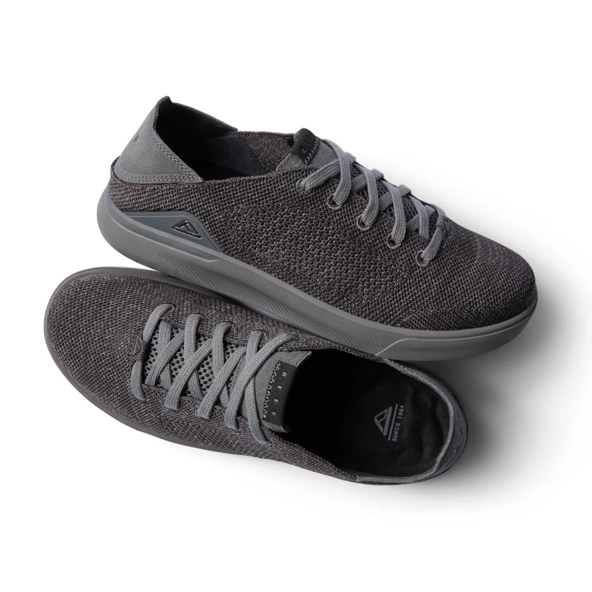Neptune HT men's black sneaker pair with lightweight breathable knit upper, REEFlex cushioning, and anatomical arch support.