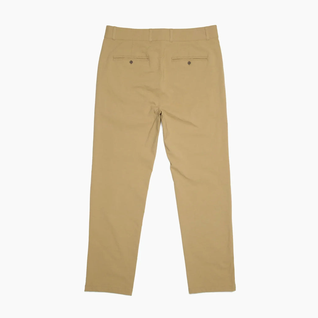 Back view of men's Carrick Stretch Pant in tan, showcasing durable fabric and comfortable tailored fit.
