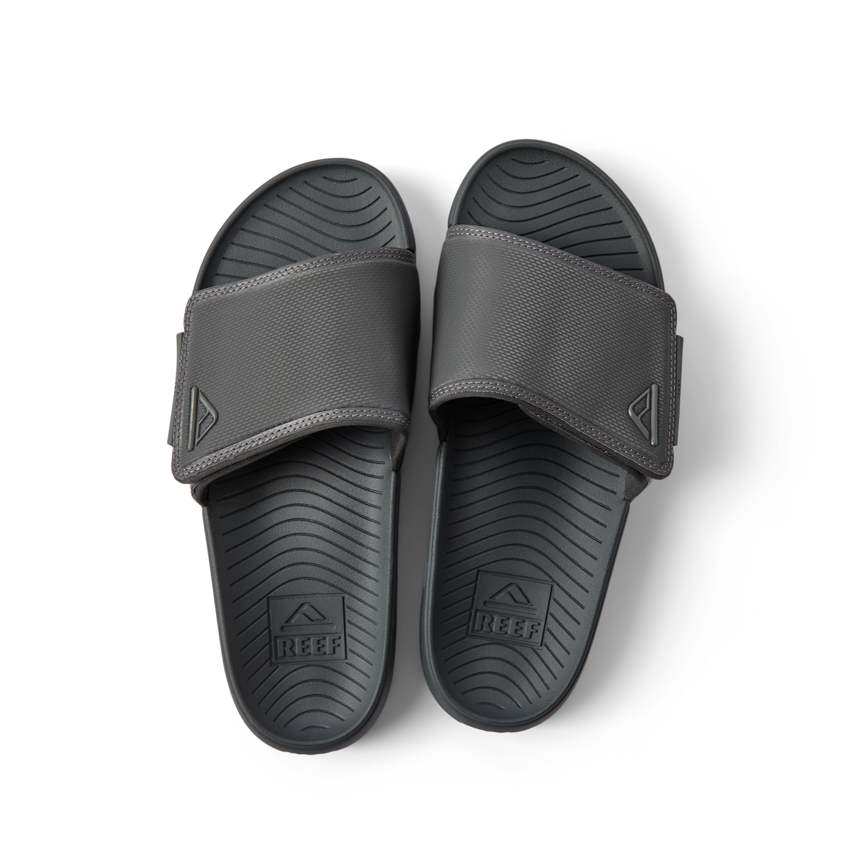 Top view of black Phantom Slab men's slides facing upward, featuring soft-rebound cushioning and anatomical arch support.