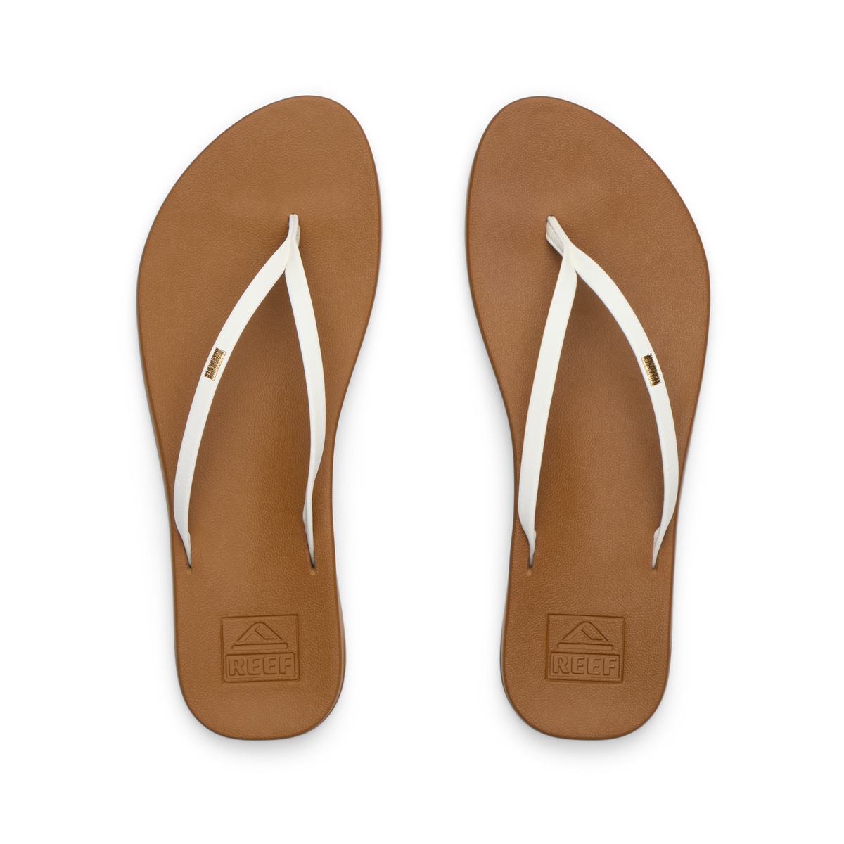 Top view of women's Cushion Slim flip flops in tan footbed with white straps, lightweight, water-friendly beach sandals.