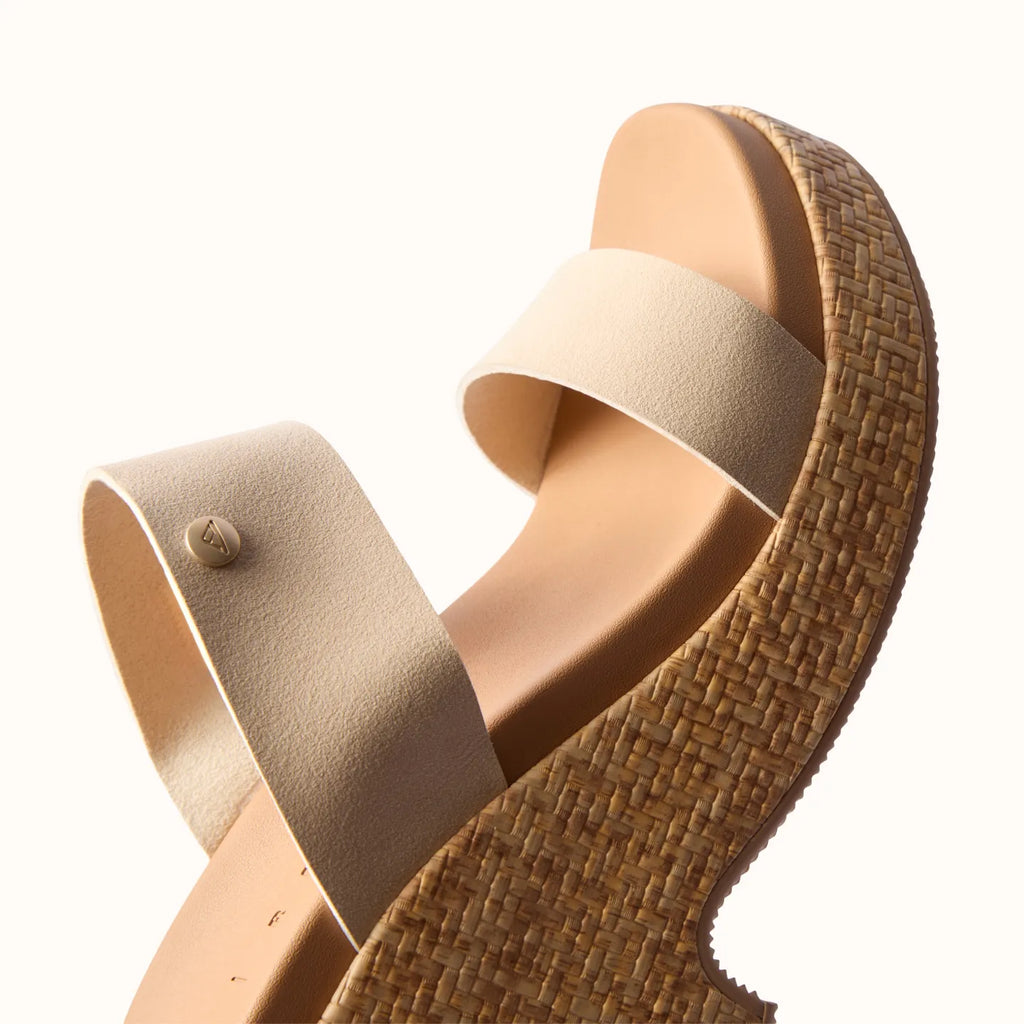Sunset Ibiza x Jenny women's sandal side view showing woven platform sole and wide vegan straps with soft-rebound cushioning