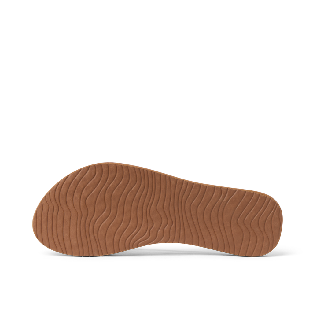 Cushion Slim women's sandal showing sole with wave pattern, angled slightly left, water-friendly and lightweight design.