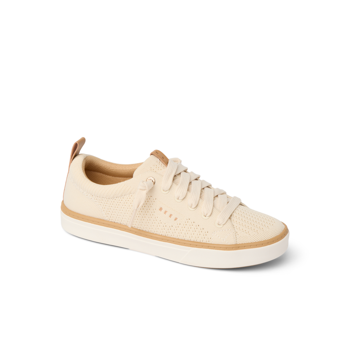 Side view of Lay Day Lite women's sneaker in beige with knit upper, lace-up, comfort features, and surf-inspired design.