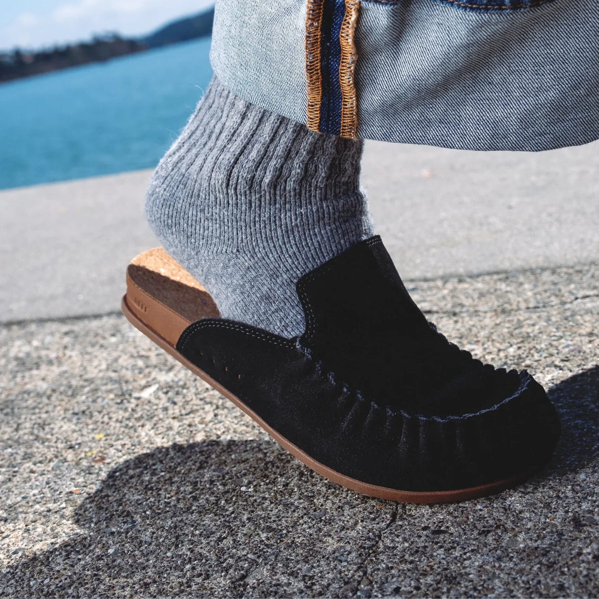 Vista Myra facing left, women's black leather clog slip-on with soft-rebound cushioning and anatomical arch support.