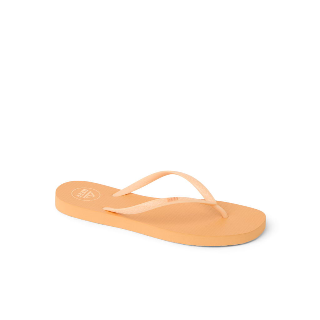 Seaside Square Toe women's flip flop facing left, showing top and side of orange chiffon sandal designed for beach comfort.