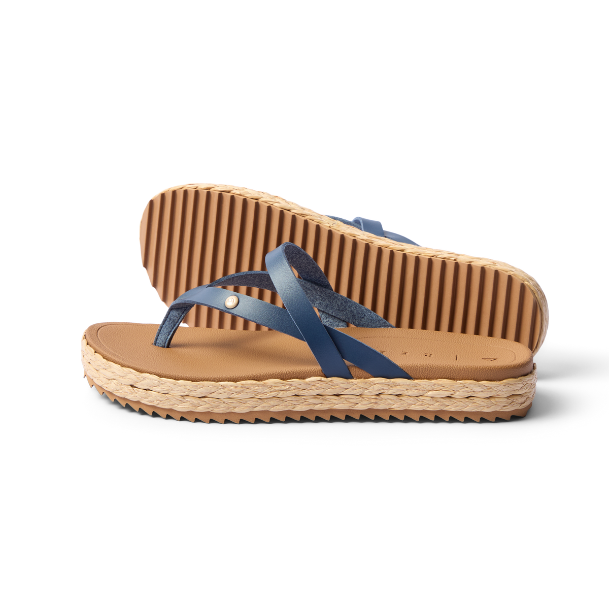 Vista Carmen women’s sandal side view facing left with navy straps, cushioned footbed, and textured sole for beach comfort.