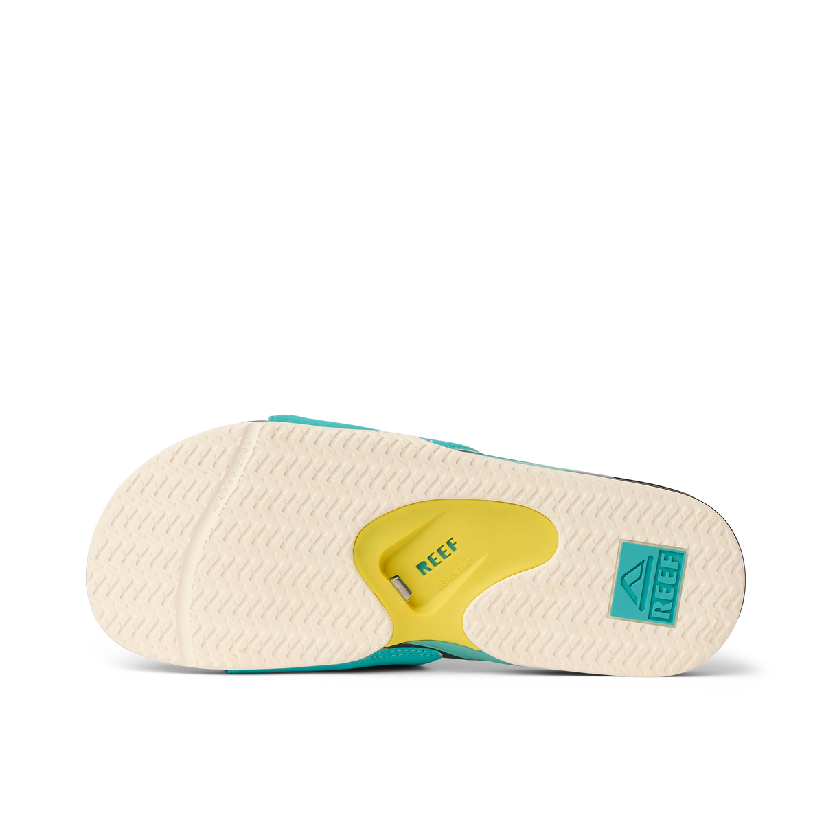 Fanning Slide showing bottom sole facing up with teal, yellow, and black colors, highlighting comfort and durability features.